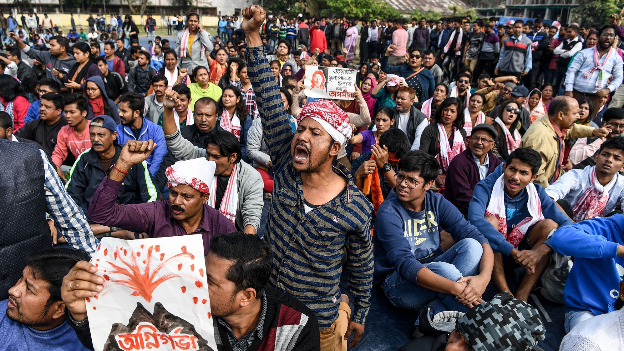 Demonstrators shout slogans during a protest in Guwahati on Friday, December 13.