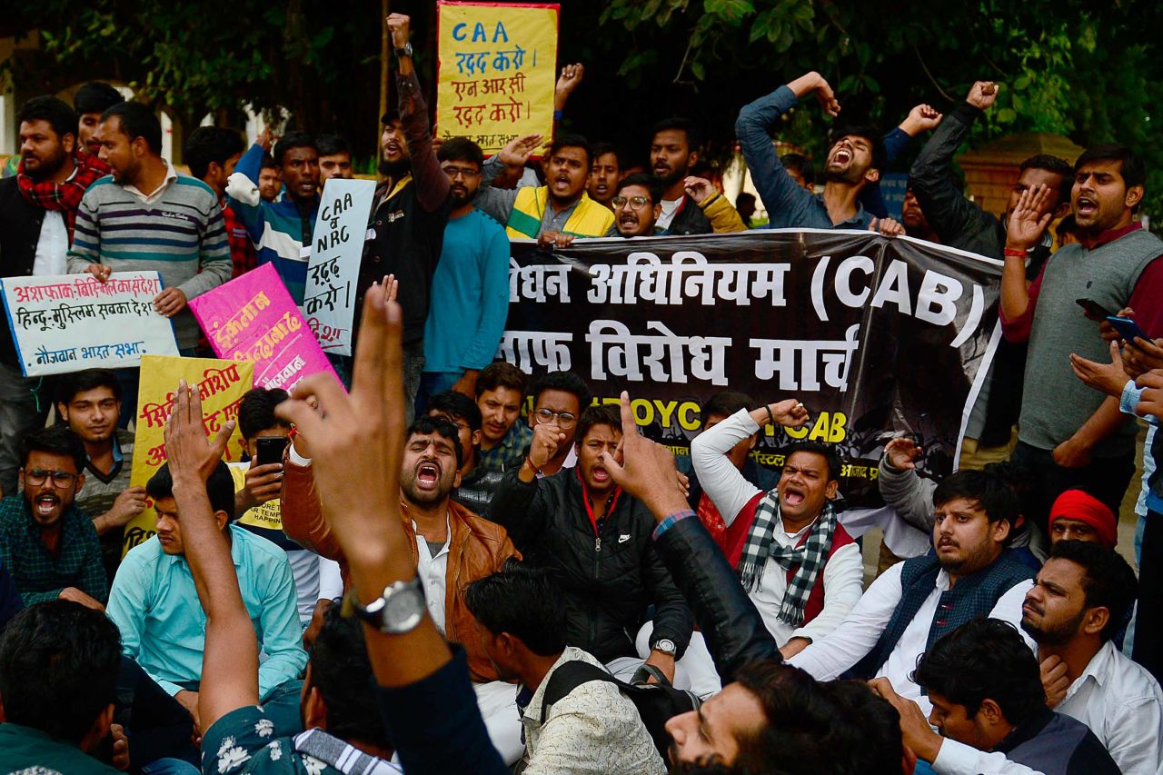 Students and activists protest outside the Allahabad University campus in Allahabad, India, on Monday, December 16.