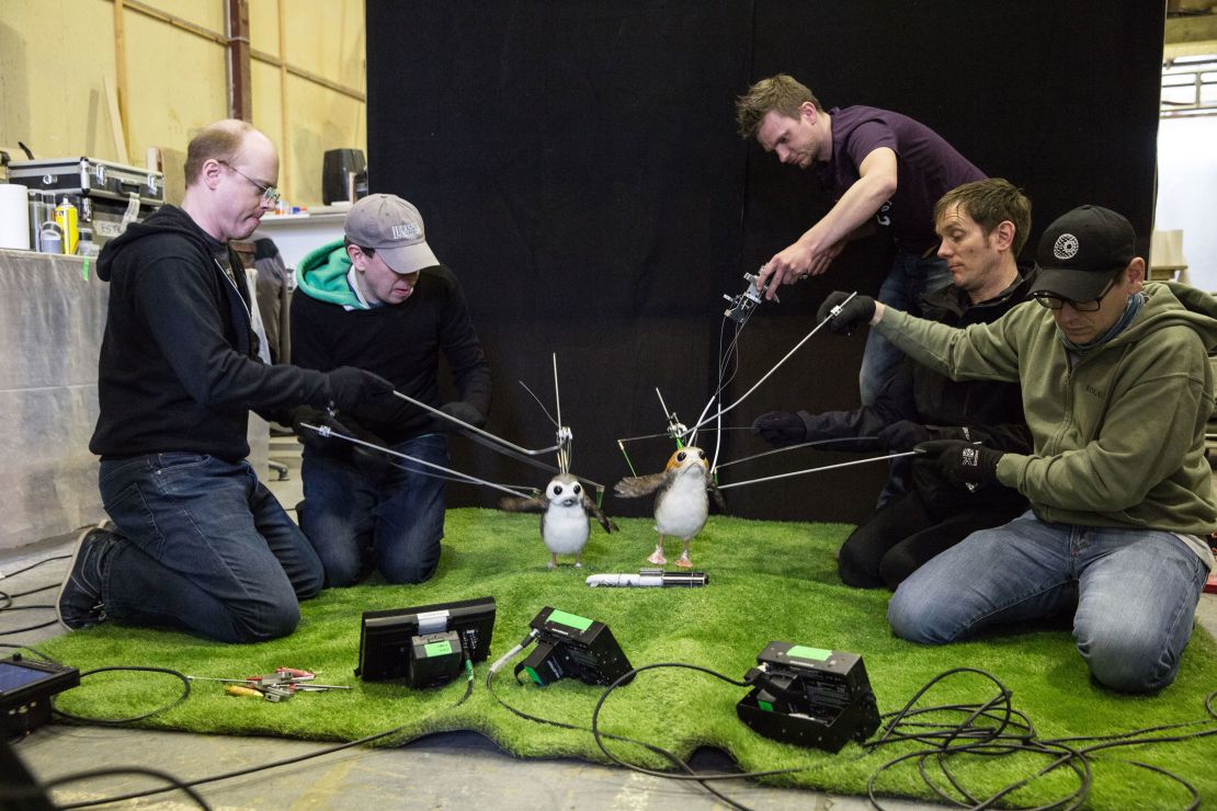 Two puppeteers, including Brian Herring and Dave Chapman on the right, were assigned to each porg.