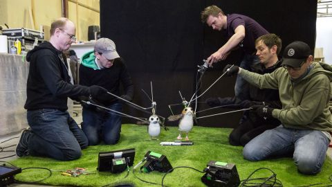 Two puppeteers, including Brian Herring and Dave Chapman on the right, were assigned to each porg.