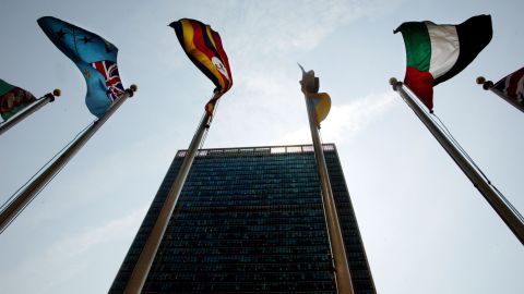 Flags fly outside the United Nations headquarters in New York.