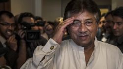 DUBAI, UAE - MARCH 24: Former Pakistani president, Pervez Musharraf salutes as he arrives to brief media and supporters during a press conference ahead of his return, at the Dubai APML party headquarters on March 24, 2013 in Dubai United Arab Emirates. The former Pakistani president and military ruler is returning to Pakistan after 4 years of self-imposed exile to participate in historic elections in May. Mr Musharraf has been granted protective bail in several cases, including conspiracy to murder which has paved his way allowing for his return. (Photo by Daniel Berehulak/Getty Images)