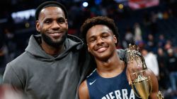 LeBron James, left, poses with his son Bronny after Sierra Canyon beat Akron St. Vincent - St. Mary in a high school basketball game, Saturday, Dec. 14, 2019, in Columbus, Ohio. 