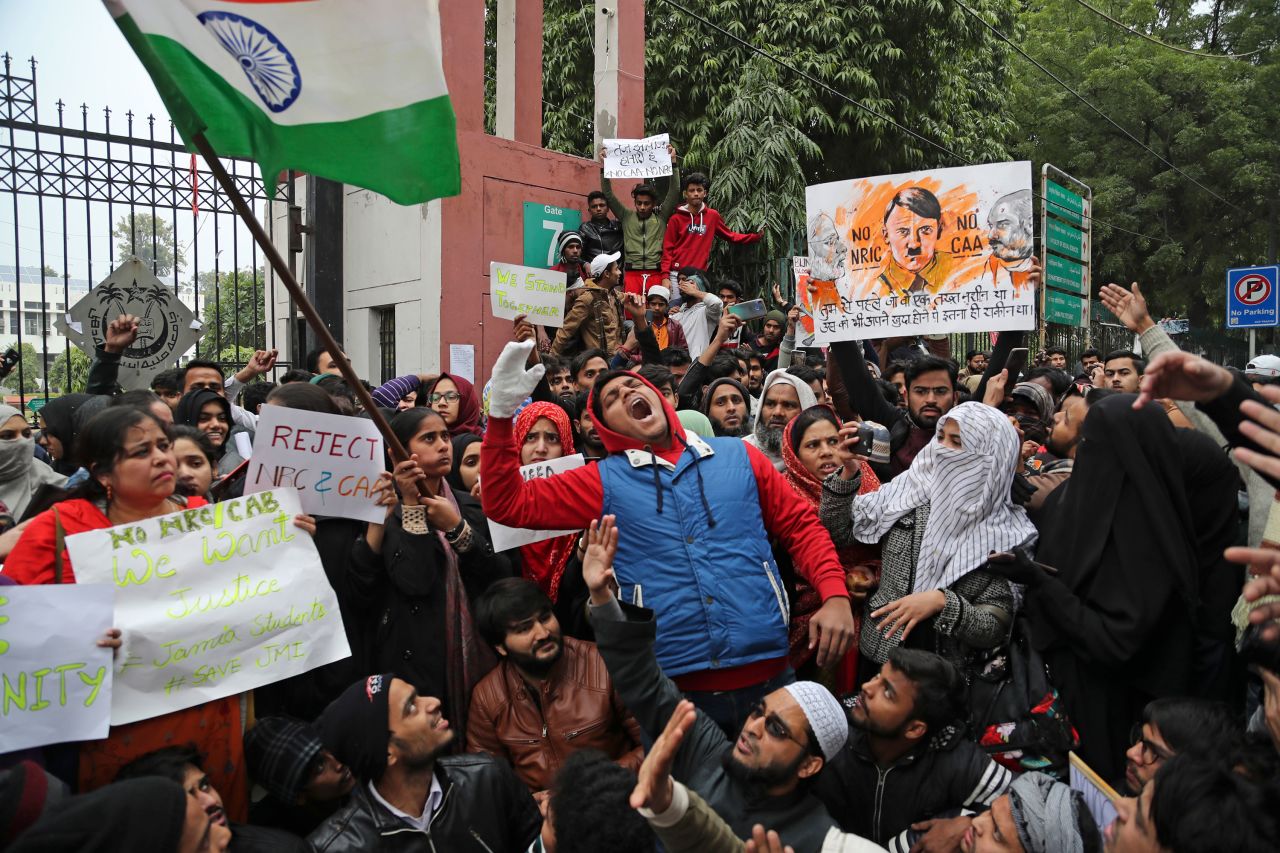 Students from Jamia Millia Islamia, a university in New Delhi, shout slogans during a protest on Tuesday, December 17.