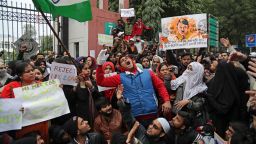 Indian students of the Jamia Millia Islamia University shout slogans during a protest, in New Delhi, India, Tuesday, Dec. 17, 2019. Indian student protests that turned into violent clashes with police galvanized opposition nationwide on Tuesday to a new law that provides a path to citizenship for non-Muslim migrants who entered the country illegally from several neighboring countries. (AP Photo/Altaf Qadri)
