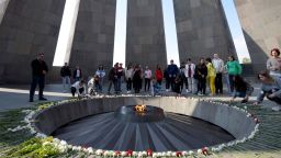 People visit the Tsitsernakaberd Armenian Genocide Memorial in Yerevan on October 30, 2019. - Armenians on October 30, 2019 rejoiced over the historic vote in the US House of Representatives that recognised as "genocide" mass killings of ethnic Armenians in the Ottoman Empire a century ago. (Photo by KAREN MINASYAN / AFP) (Photo by KAREN MINASYAN/AFP via Getty Images)