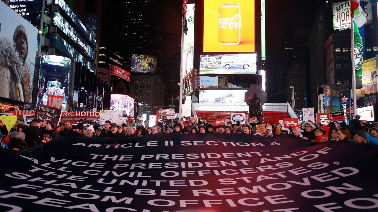 Demonstrators join national impeachment demonstrations to demand an end to Donald Trump's presidency.