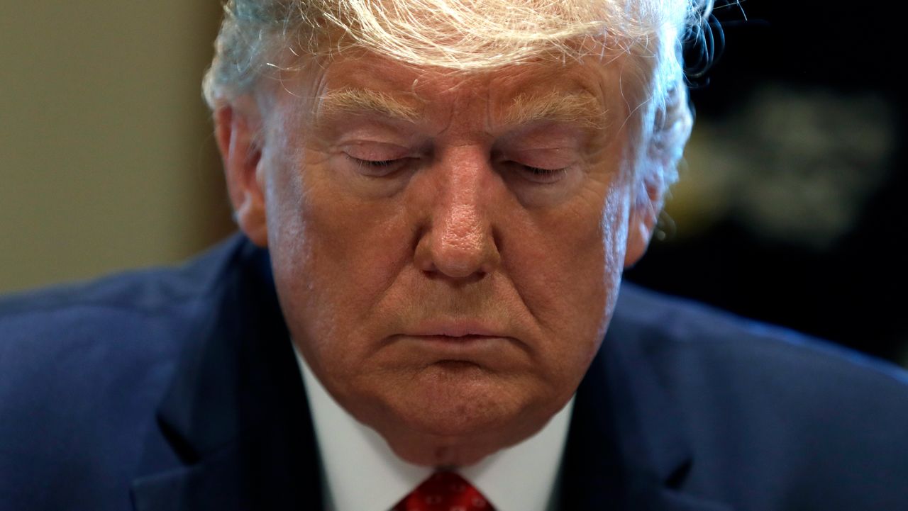 President Donald Trump listens during a cabinet meeting at the White House, Tuesday, Nov. 19, 2019, in Washington. (AP Photo/ Evan Vucci)