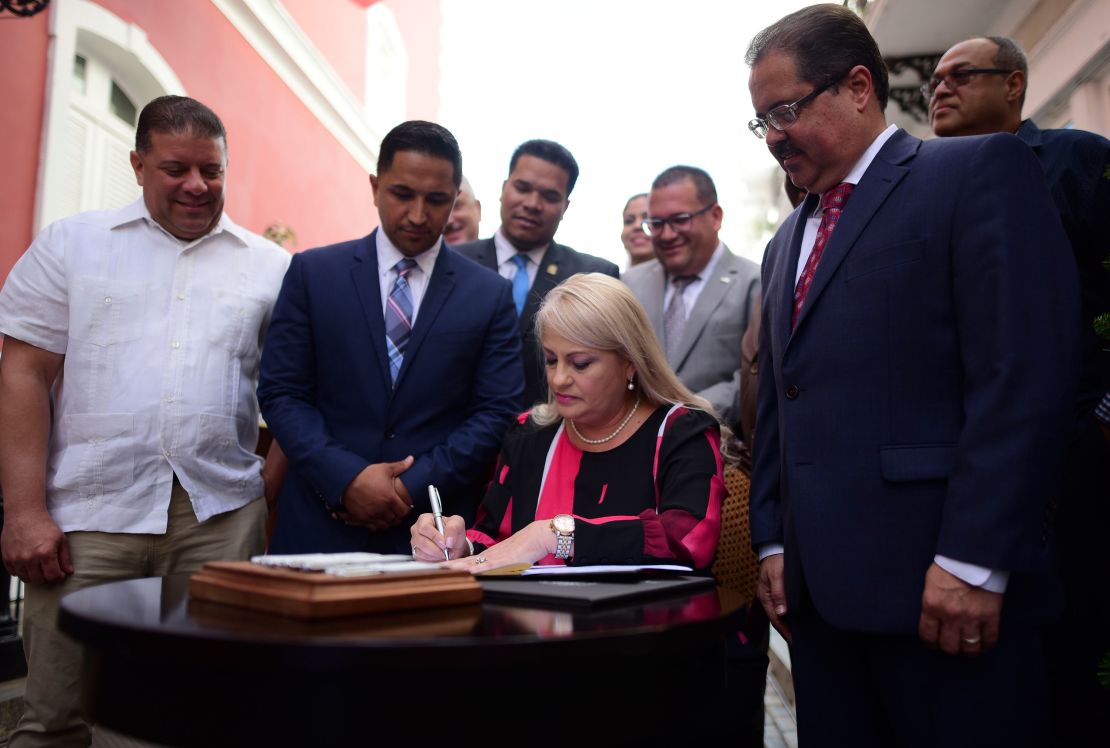Gov. Wanda Vazquez signs a bill into law that keeps cockfighting alive on the island despite a federal ban. 