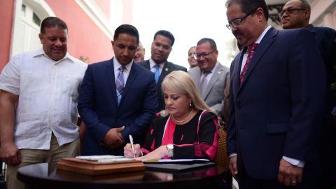 Gov. Wanda Vazquez signs a bill into law that keeps cockfighting alive on the island despite a federal ban. 