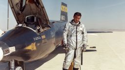 Air Force test pilot Maj. Michael J. Adams stands beside X-15 ship number one. Adams was selected for the X-15 program in 1966 and made his first flight on Oct. 6, 1966. On Nov. 15, 1967, Adams made his seventh and final X-15 flight. The X-15 launched from the B-52, but during the ascent an electrical problem affected the X-15's control system. The aircraft crashed northwest of Cuddeback Lake, California, causing the death of Adams.He was posthumously awarded Air Force astronaut wings because his final flight exceeded 50 miles in altitude. Adams was the only pilot lost in the 199-flight X-15 program.