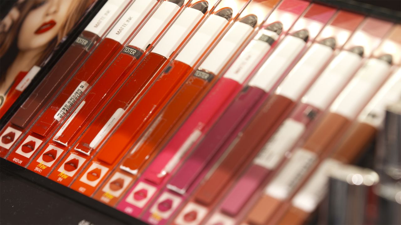 Colorful lip glosses are displayed inside a cosmetic store in Seoul, South Korea.