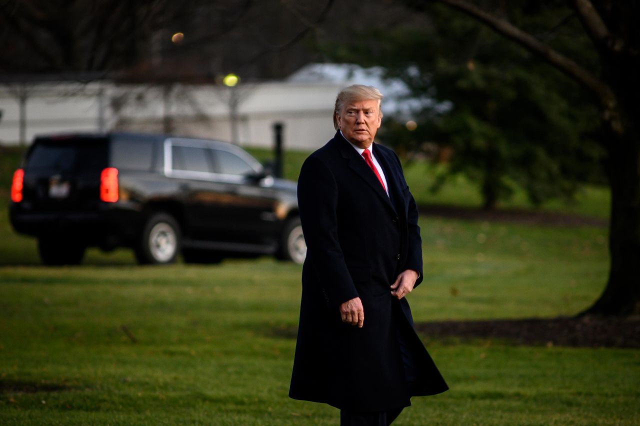 US President Donald Trump leaves the White House on his way to a campaign rally in Michigan on Wednesday, December 18.