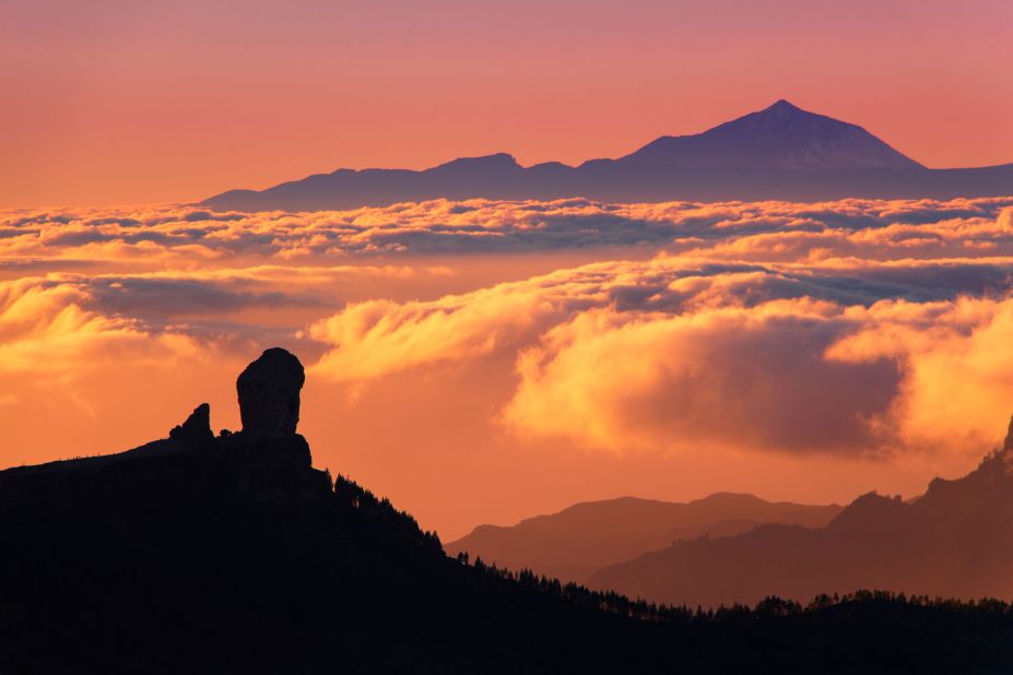<strong>Above the clouds:</strong> A thick cloud layer often lingers just below Teide volcano, with clear skies above.  