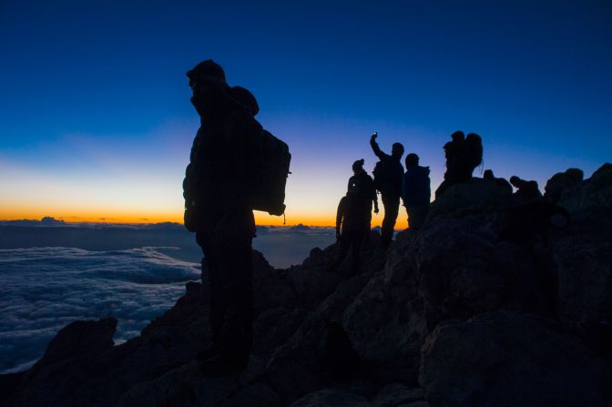 <strong>Stargazing:</strong> Donning warm clothes and headlamps, stargazers gather for nighttime viewing parties in Teide National Park.