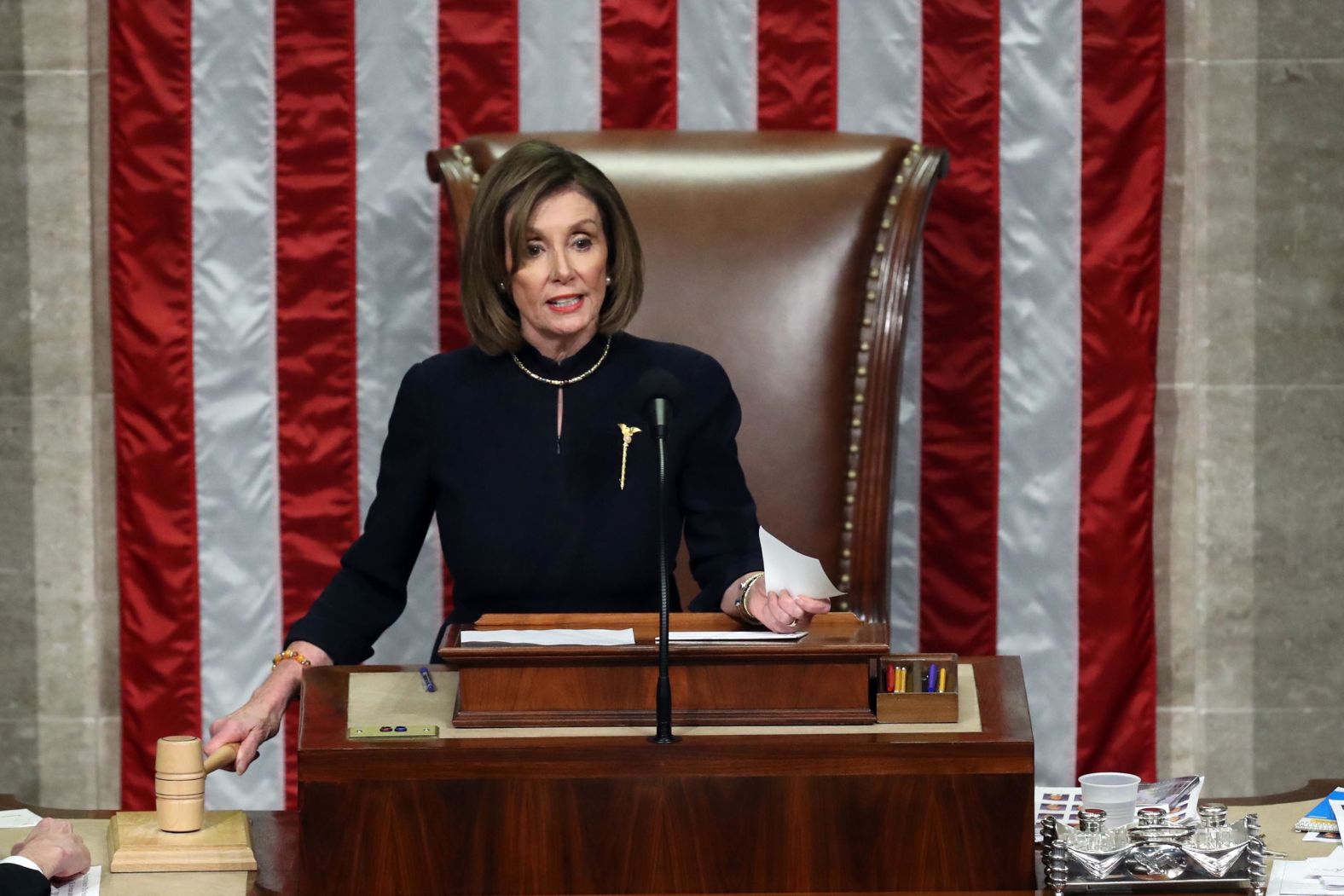 After a House vote on December 18, Pelosi announces that the articles of impeachment have passed.