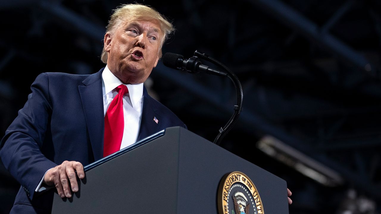 President Donald Trump speaks during a campaign rally at Kellogg Arena, Wednesday, Dec. 18, 2019, in Battle Creek, Mich. (AP Photo/ Evan Vucci)