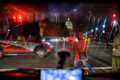 The US Capitol is seen from a crosswalk as the House of Representatives prepares to vote on impeachment.