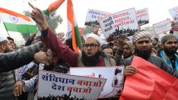 Protesters shout slogans at a demonstration against Indias new citizenship law in New Delhi on December 19, 2019. - Big rallies are expected across India on December 19 as the tumultuous and angry reaction builds against a citizenship law seen as discriminatory against Muslims.