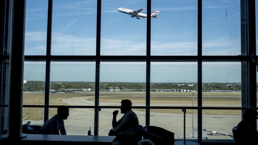 Passengers wait for their flights at Heathrow Airport's Terminal 5 in west London, on September 13, 2019.