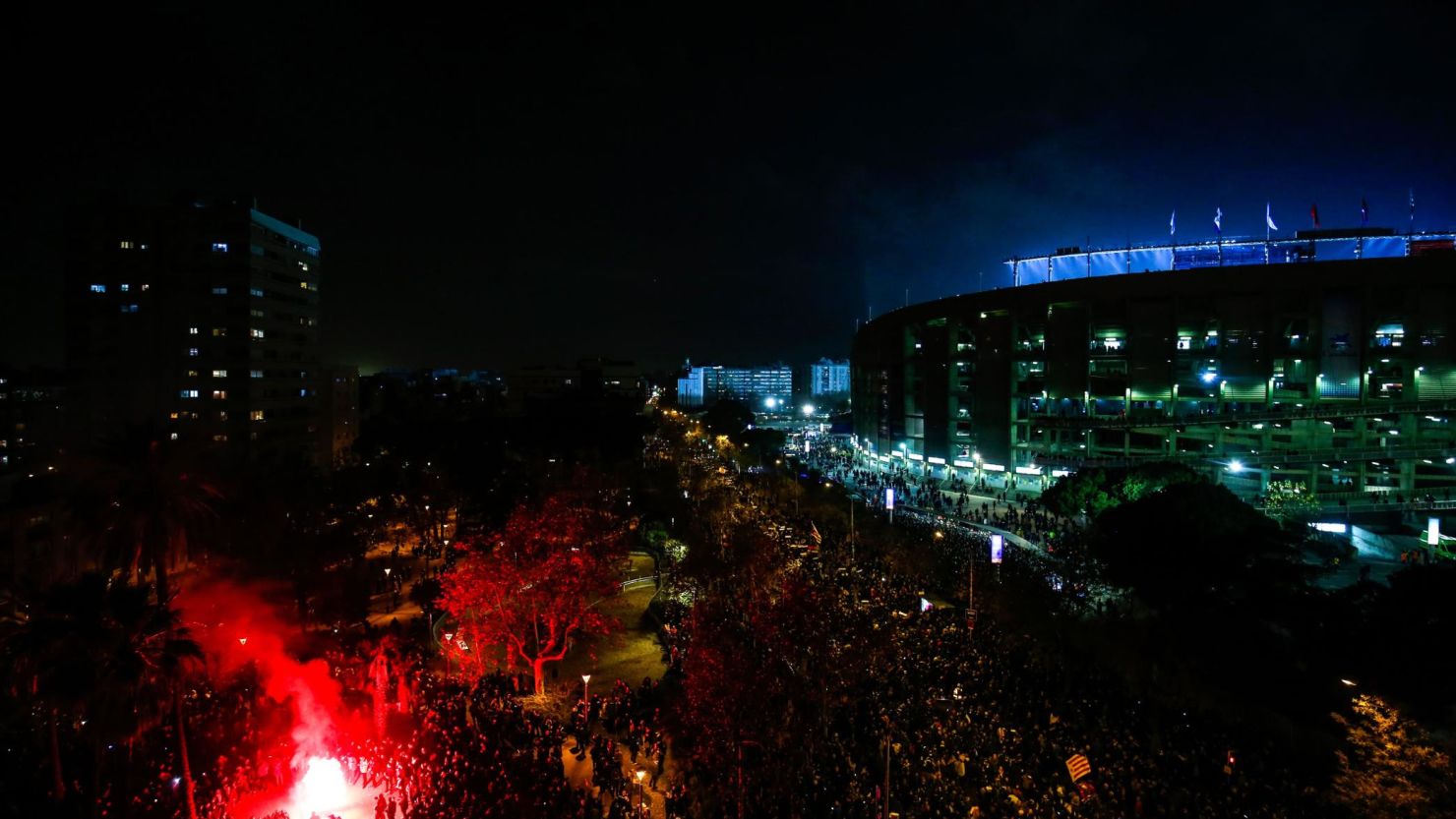 Demonstrators gather during a protest outside the Camp Nou during El Clasico.
