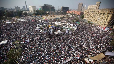 People take part in Friday prayers in Cairo's Tahrir Square before a mass rally in November 2011.
