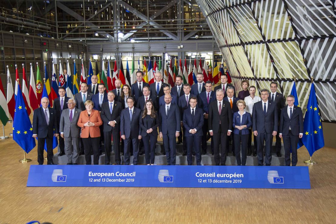 Family photo of the European Leaders. Finnish Prime Minister Sanna Marin is sixth from left, front row.