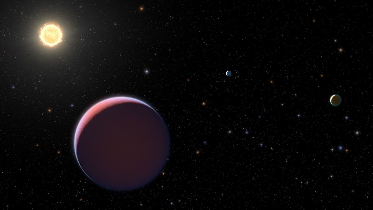 This artist's illustration of the Kepler 51 system shows newly discovered super-puff exoplanets, which are also called "cotton candy" exoplanets because they're so lightweight.