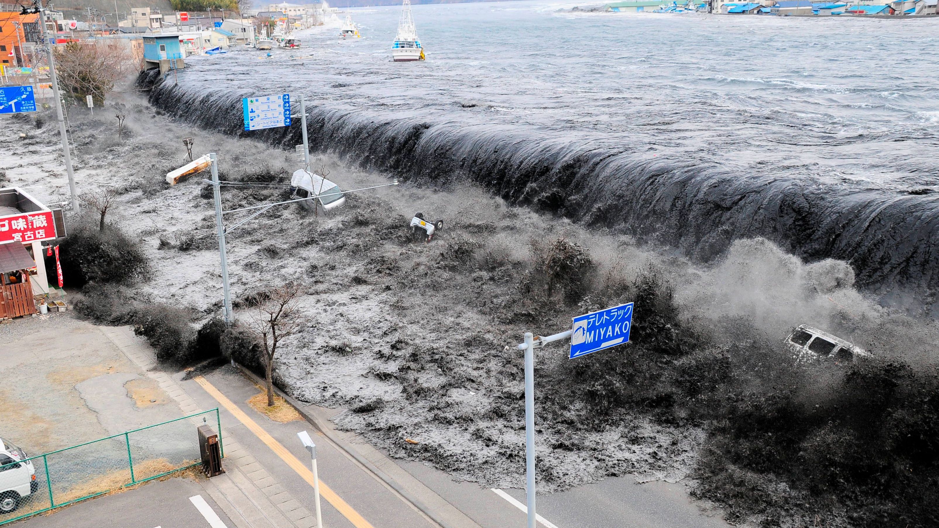 A wave approaches Miyako, Japan, after a 9.1 magnitude earthquake occurred in March 2011. <a href="https://www.cnn.com/2013/07/17/world/asia/japan-earthquake---tsunami-fast-facts/index.html" target="_blank">The earthquake</a> caused a tsunami with 30-foot waves that damaged several nuclear reactors in the area. It is the largest earthquake ever to hit Japan.