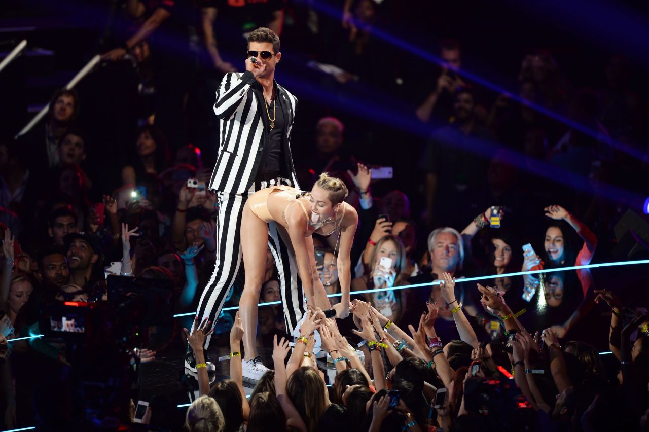 Robin Thicke and Miley Cyrus perform on stage during the MTV Video Music Awards in August 2013. <a href="https://www.cnn.com/2013/08/26/showbiz/music/miley-cyrus-mtv-vmas-gaga/index.html" target="_blank">The provocative performance</a> dominated the headlines and had many people discussing whether it was too risque.
