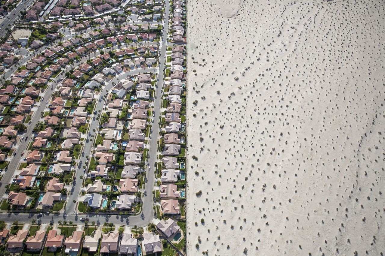 In this aerial photo, taken in April 2015, a housing development meets the edge of undeveloped desert in Cathedral City, California. California Gov. Jerry Brown imposed mandatory water restrictions on residents, businesses and farms in <a href="http://www.cnn.com/2014/07/17/us/gallery/california-drought/index.html" target="_blank">the drought-ravaged state,</a> ordering cities and towns to reduce their usage by 25%.