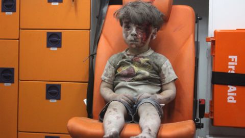 This still image, taken from a video posted by the Aleppo Media Center, shows a young boy in an ambulance after an airstrike in Aleppo, Syria, in August 2016. It took nearly an hour to dig the boy, identified as Omran Daqneesh, out from the rubble, an activist told CNN. <a href="http://www.cnn.com/2016/08/17/world/syria-little-boy-airstrike-victim/index.html" target="_blank">The airstrike destroyed his home</a> where he lived with his parents and two siblings. <a href="https://www.cnn.com/2013/08/27/world/meast/syria-civil-war-fast-facts/index.html" target="_blank">The Syrian civil war</a> started in April 2011 and is still ongoing.