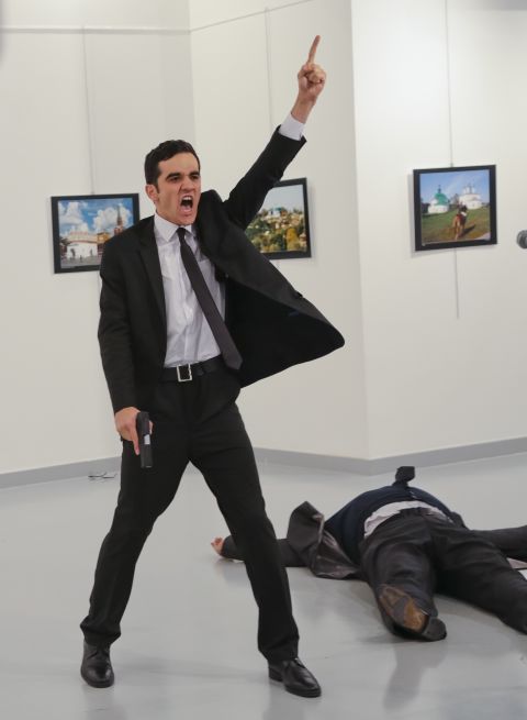 Mevlut Mert Altintas gestures <a href="http://www.cnn.com/2016/12/19/middleeast/gallery/andrey-karlov-shooting/index.html" target="_blank">after assassinating Andrey Karlov,</a> the Russian ambassador to Turkey, at a photo exhibition in Ankara, Turkey, in December 2016. Altintas, an off-duty Turkish police officer, was then fatally shot during a shootout. In a video that circulated on social media, Altintas was heard shouting, "Allahu akbar (God is greatest). Do not forget Aleppo! Do not forget Syria! Do not forget Aleppo! Do not forget Syria!" Russia is an ally of the Syrian regime and has carried out airstrikes to prop up embattled leader Bashar al-Assad. Karlov, 62, <a href="http://www.cnn.com/2016/12/19/europe/who-was-andrey-karlov/" target="_blank">had served in Ankara since 2013.</a>