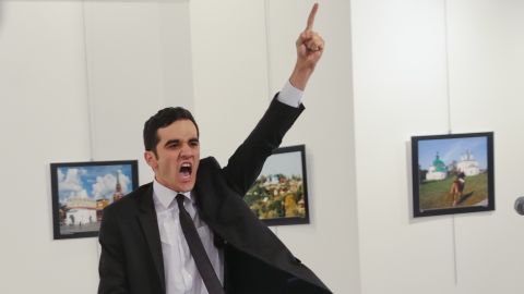 Mevlut Mert Altintas gestures <a href="http://www.cnn.com/2016/12/19/middleeast/gallery/andrey-karlov-shooting/index.html" target="_blank">after assassinating Andrey Karlov,</a> the Russian ambassador to Turkey, at a photo exhibition in Ankara, Turkey, in December 2016. Altintas, an off-duty Turkish police officer, was then fatally shot during a shootout. In a video that circulated on social media, Altintas was heard shouting, "Allahu akbar (God is greatest). Do not forget Aleppo! Do not forget Syria! Do not forget Aleppo! Do not forget Syria!" Russia is an ally of the Syrian regime and has carried out airstrikes to prop up embattled leader Bashar al-Assad. Karlov, 62, <a href="http://www.cnn.com/2016/12/19/europe/who-was-andrey-karlov/" target="_blank">had served in Ankara since 2013.</a>