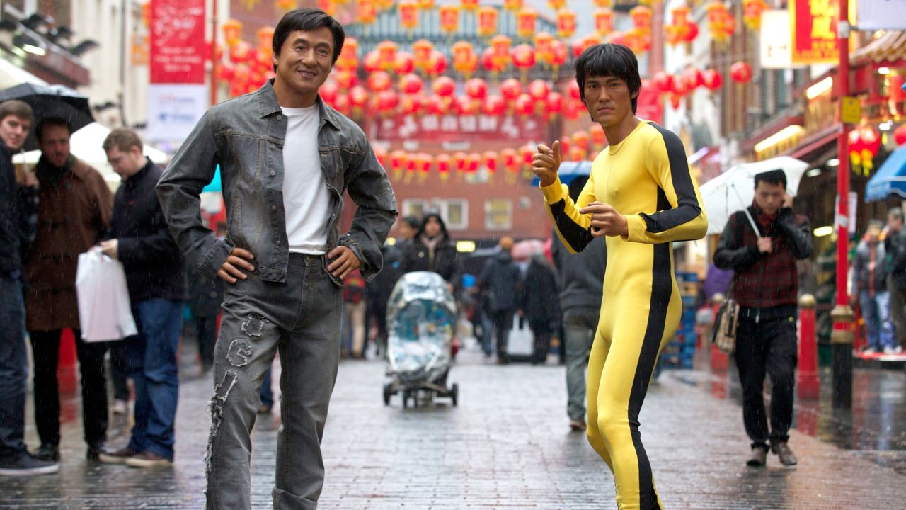 Jackie Chan, left, and Bruce Lee wax figures are pictured during a photo call in the heart of London's Chinatown on January 29, 2014, ahead of Lunar New Year celebrations. 