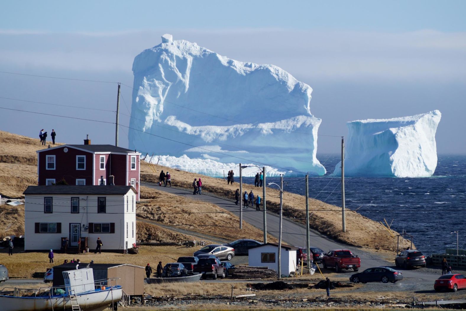 Residents view the first iceberg of the season as it passes the South Shore, also known as <a href="https://www.cnn.com/travel/article/ferryland-iceberg-trnd/index.html" target="_blank">Canada's "Iceberg Alley,"</a> near Ferryland, Newfoundland and Labrador, in April 2017.