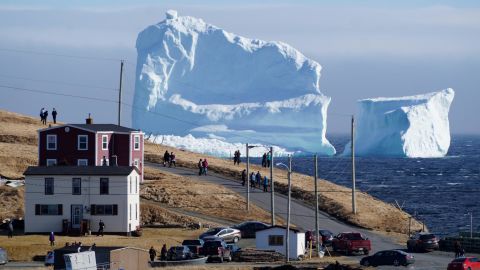 Residents view the first iceberg of the season as it passes the South Shore, also known as <a href="https://www.cnn.com/travel/article/ferryland-iceberg-trnd/index.html" target="_blank">Canada's "Iceberg Alley,"</a> near Ferryland, Newfoundland and Labrador, in April 2017.