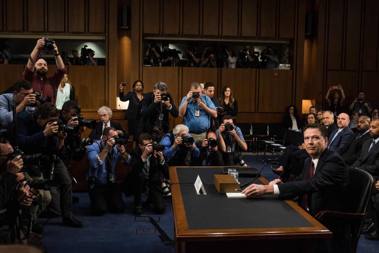 Former FBI Director James Comey is photographed before <a href="http://www.cnn.com/2017/06/08/politics/james-comey-testimony-donald-trump/index.html" target="_blank">testifying to the Senate Intelligence Committee,</a> one month after US President Donald Trump fired him in May 2017. <a href="https://www.cnn.com/interactive/2017/06/politics/comey-hearing-cnnphotos/index.html" target="_blank">Comey discussed</a> the FBI's Russia investigation, his private interactions with Trump and how he handled the Hillary Clinton email probe.