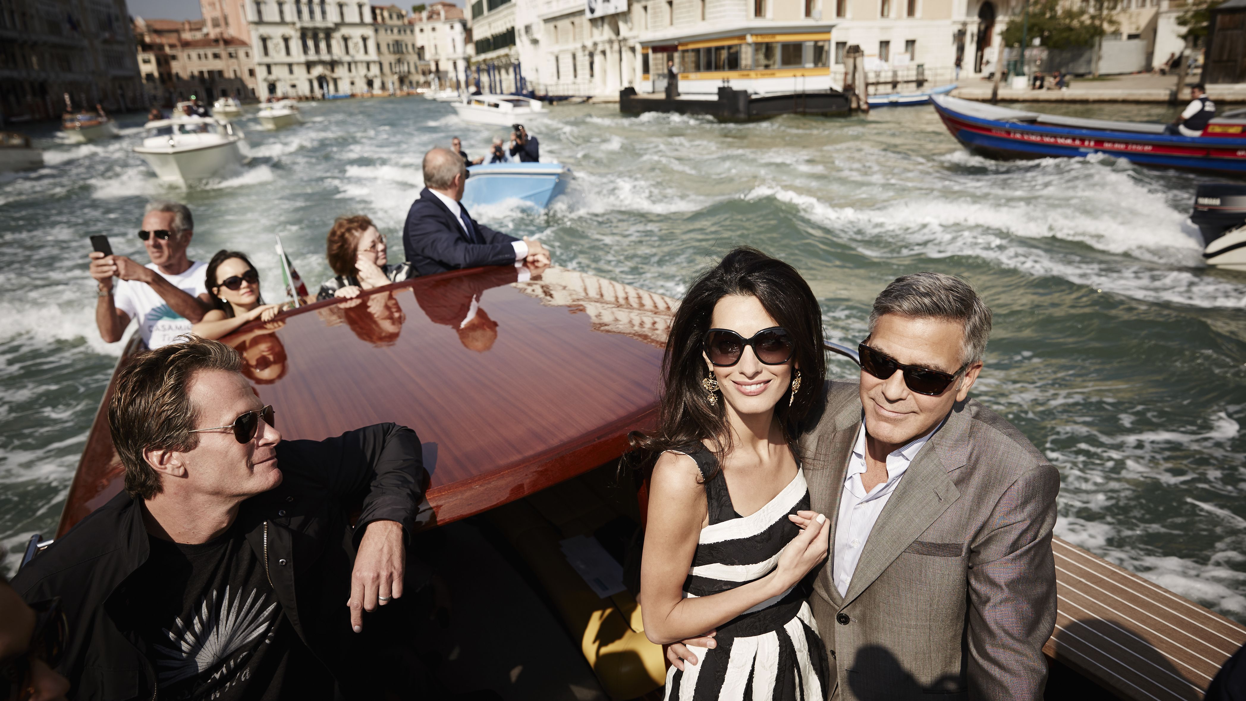 Actor George Clooney, right, and his fiancee, lawyer Amal Alamuddin, arrive in Venice, Italy, in September 2014. <a href="http://www.cnn.com/2014/09/27/showbiz/gallery/clooney-wedding/index.html" target="_blank">The two were married</a> in a private ceremony attended by some of their celebrity friends.
