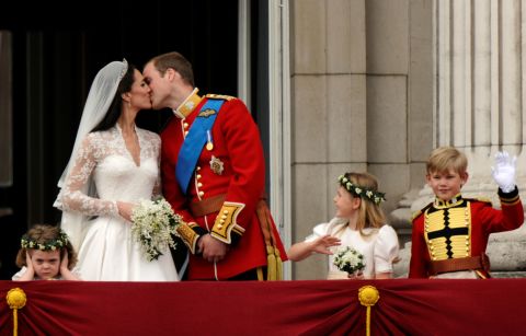 Britain's Prince William kisses his new wife, Catherine, on the balcony of Buckingham Palace in April 2011. <a href="https://www.cnn.com/2016/04/29/europe/will-kate-five-year-wedding-anniversary/index.html" target="_blank">The wedding</a> was watched by millions around the world.