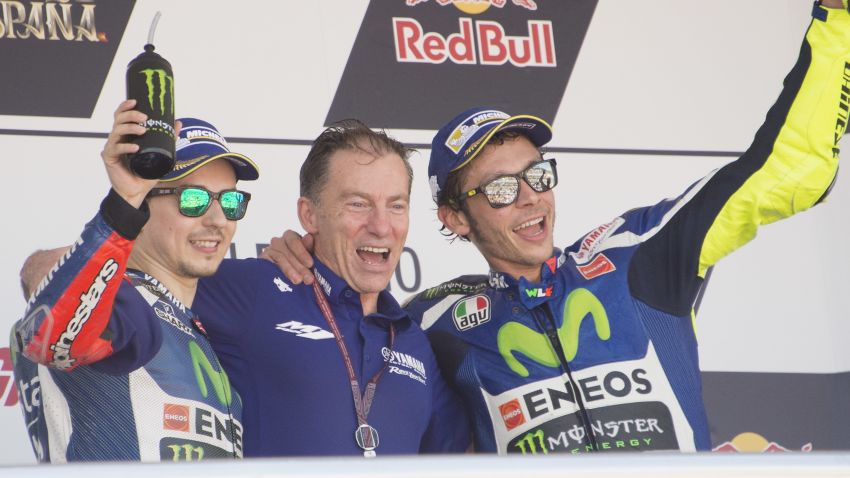 JEREZ DE LA FRONTERA, SPAIN - APRIL 24:  (L-R) Jorge Lorenzo of Spain and Movistar Yamaha MotoGP,  Lin Jarvis of Britain and Yamaha Factory Team and Valentino Rossi of Italy and Movistar Yamaha MotoGP  on the podium at the end of the MotoGP race during the MotoGp of Spain - Race at Circuito de Jerez on April 24, 2016 in Jerez de la Frontera, Spain.  (Photo by Mirco Lazzari gp/Getty Images)