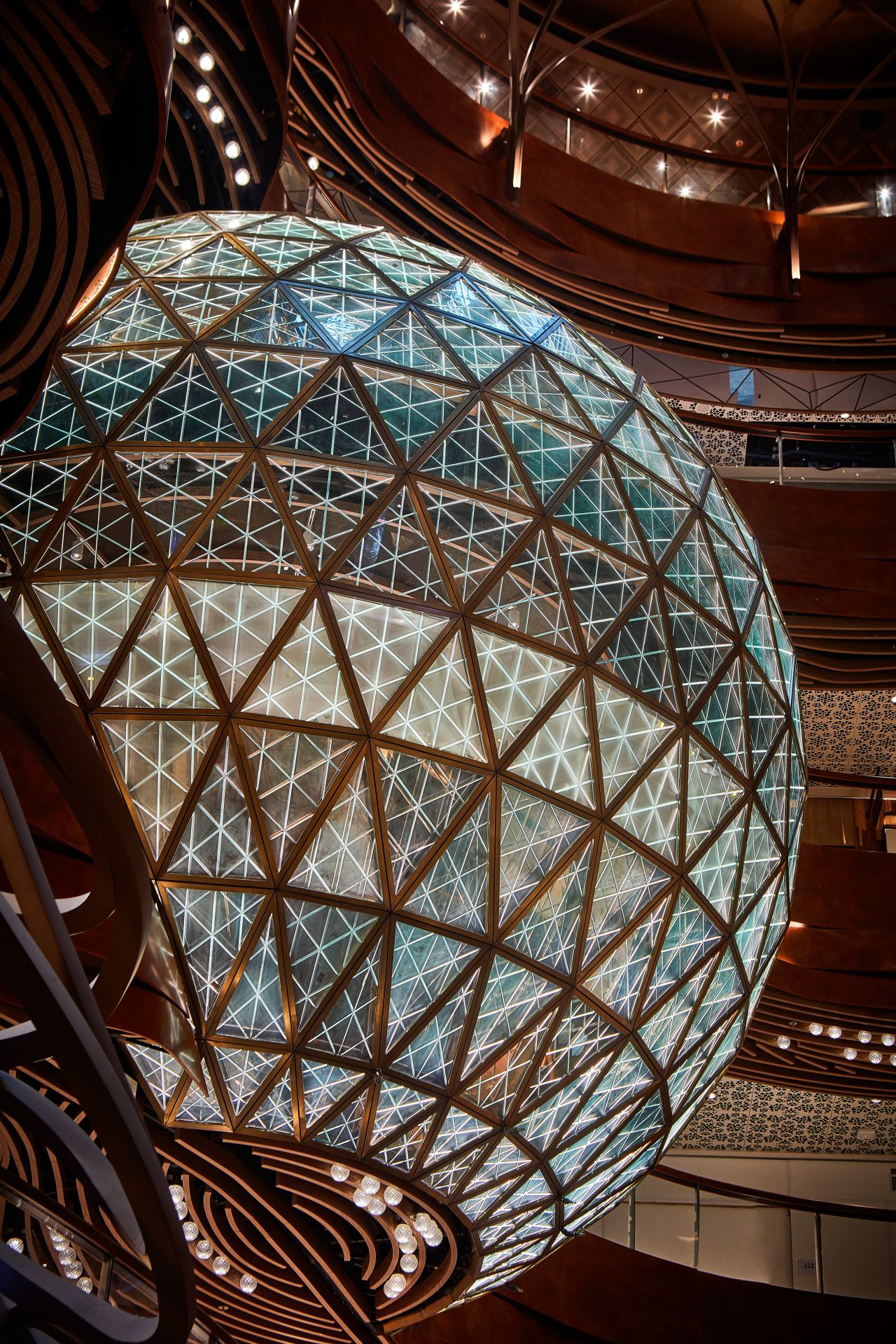A large geometric sphere looms over one of the mall's atriums. Art and cultural programs are ran in the retail complex throughout the year.