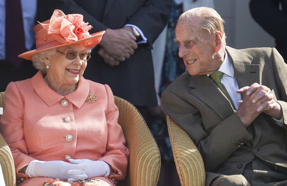 Queen Elizabeth and Prince Philip attend a polo match in Egham, England, in June 2018.
