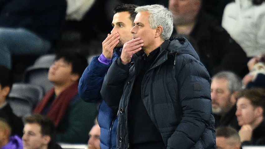 Tottenham Hotspur's Portuguese head coach Jose Mourinho (R) and Tottenham Hotspur's assistant head coach Joao Sacramento (L) react on the touchline during the English Premier League football match between Tottenham Hotspur and Chelsea at Tottenham Hotspur Stadium in London, on December 22, 2019. (Photo by Glyn KIRK / IKIMAGES / AFP) / RESTRICTED TO EDITORIAL USE. No use with unauthorized audio, video, data, fixture lists, club/league logos or 'live' services. Online in-match use limited to 45 images, no video emulation. No use in betting, games or single club/league/player publications. (Photo by GLYN KIRK/IKIMAGES/AFP via Getty Images)