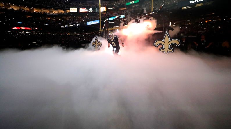 New Orleans Saints quarterback Drew Brees runs onto the field before an NFL game against the Indianapolis Colts in New Orleans on Monday, December 16. <a href="index.php?page=&url=https%3A%2F%2Fwww.cnn.com%2F2019%2F12%2F17%2Fus%2Fdrew-brees-nfl-touchdown-passing-record-trnd%2Findex.html" target="_blank">Drew Brees now has the most touchdown passes in NFL history</a>, breaking Peyton Manning's record of 539 during the third quarter on a pass to tight end Josh Hill. 