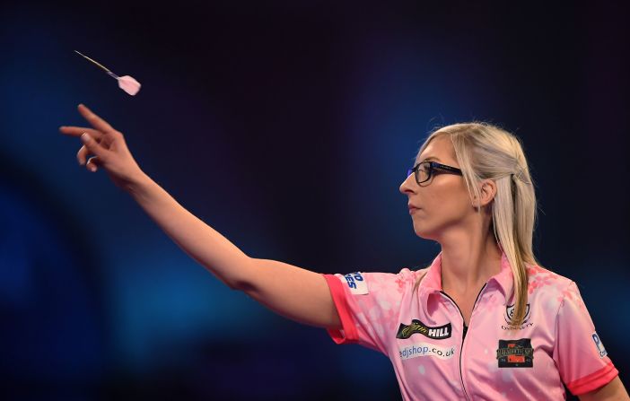 Fallon Sherrock competes in her first round against Ted Evetts during the 2020 William Hill Darts Championship in London, England, on Tuesday, December 17. <a href="index.php?page=&url=https%3A%2F%2Fwww.cnn.com%2F2019%2F12%2F18%2Fsport%2Ffallon-sherrock-darts-scli-intl-spt-itl%2Findex.html" target="_blank">Sherrock made history on Tuesday when she became the first woman to beat a man in the world championship match. </a>