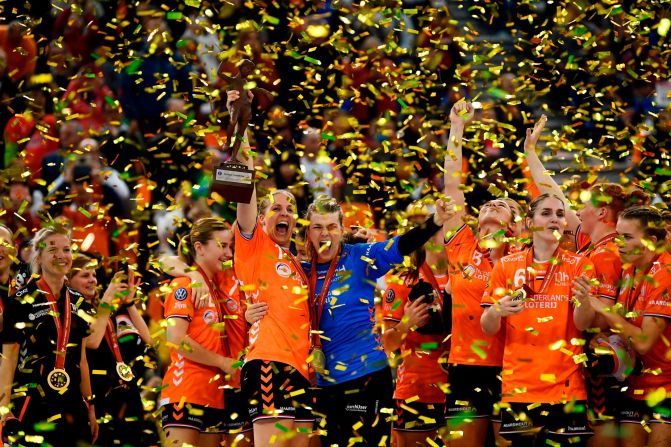 The Netherlands' women's handball team celebrates winning the World Championship match against Spain in Kumamoto, Japan, on Sunday, December 15. 