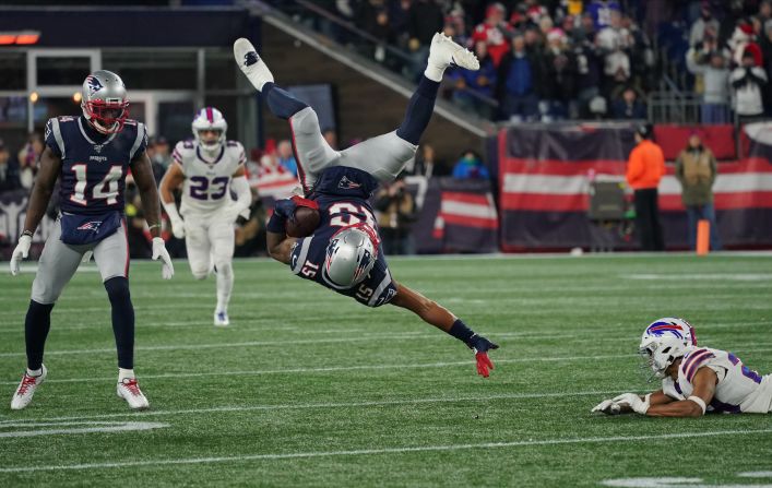 New England Patriots wide receiver N'Keal Harry flies into the air following a tackle by Buffalo Bills' Kevin Johnson during a game on Saturday, December 21, in Foxborough, Massachusetts. 
