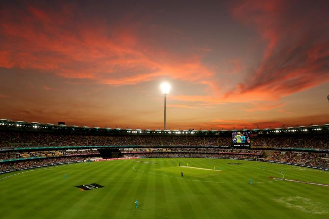 The sun sets during the Big Bash League match between the Brisbane Heat and the Sydney Thunder on Tuesday, December 17, in Brisbane, Australia.
