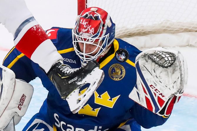 Sweden goalie Lars Johansson attempts to block a shot during a match against the Czech Republic during the Euro Hockey Tour in Moscow, Russia, on Sunday, December 15. 